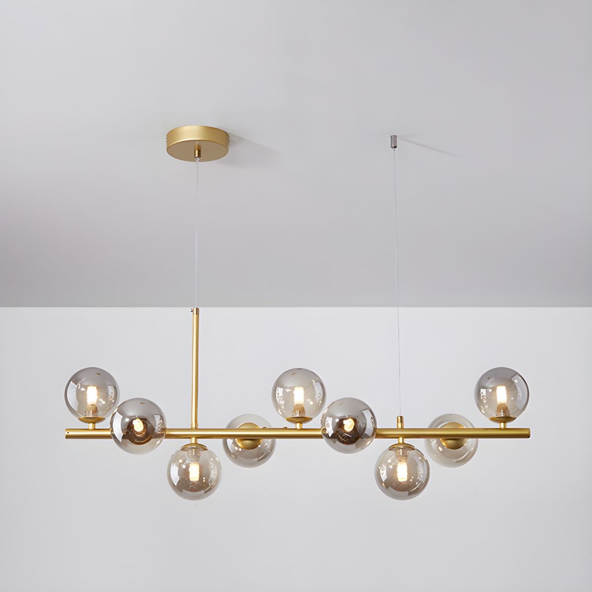 Lioroora kroonluchter met glazen bol goudkleurige afwerking 12-Light