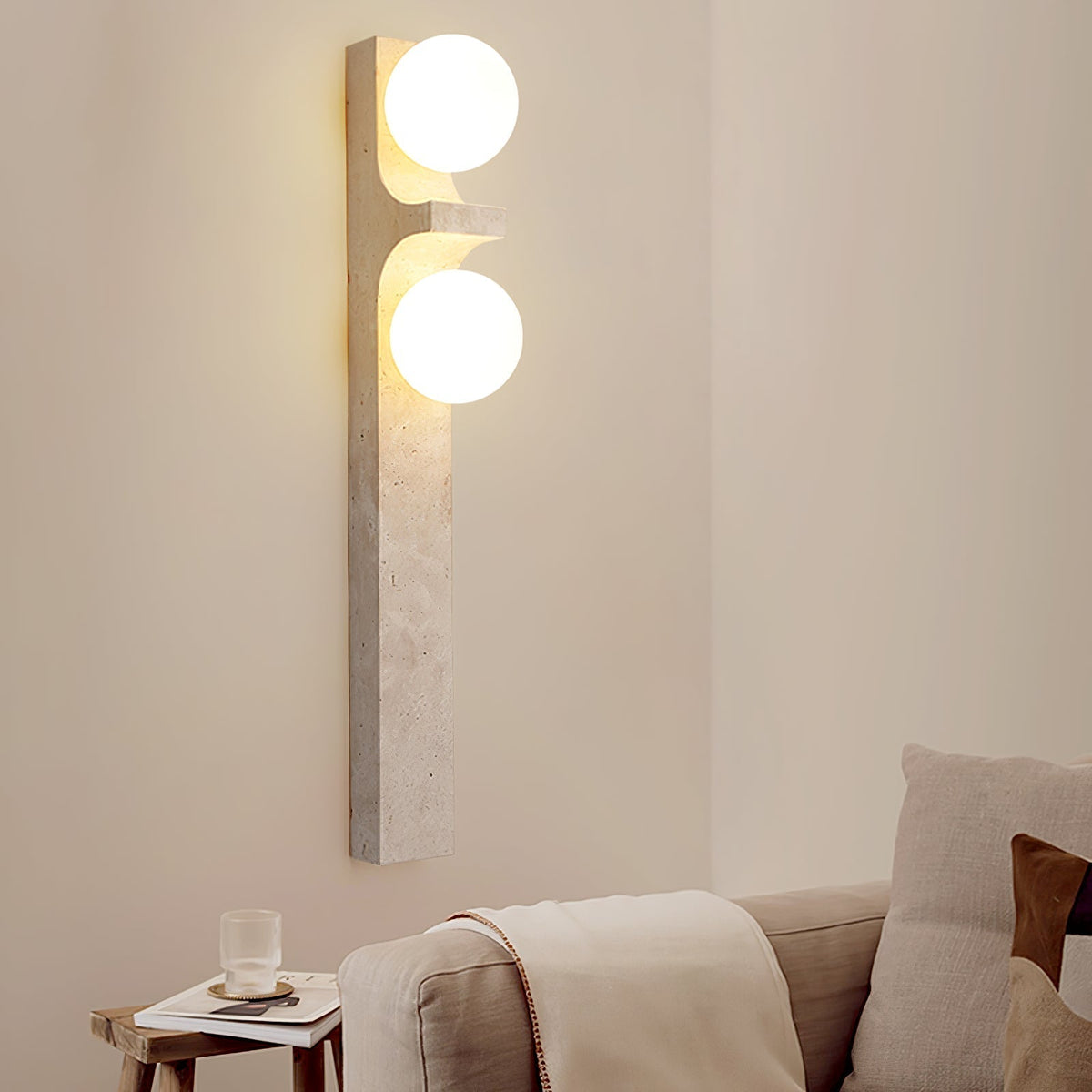 Umiren wandlamp van geel travertin