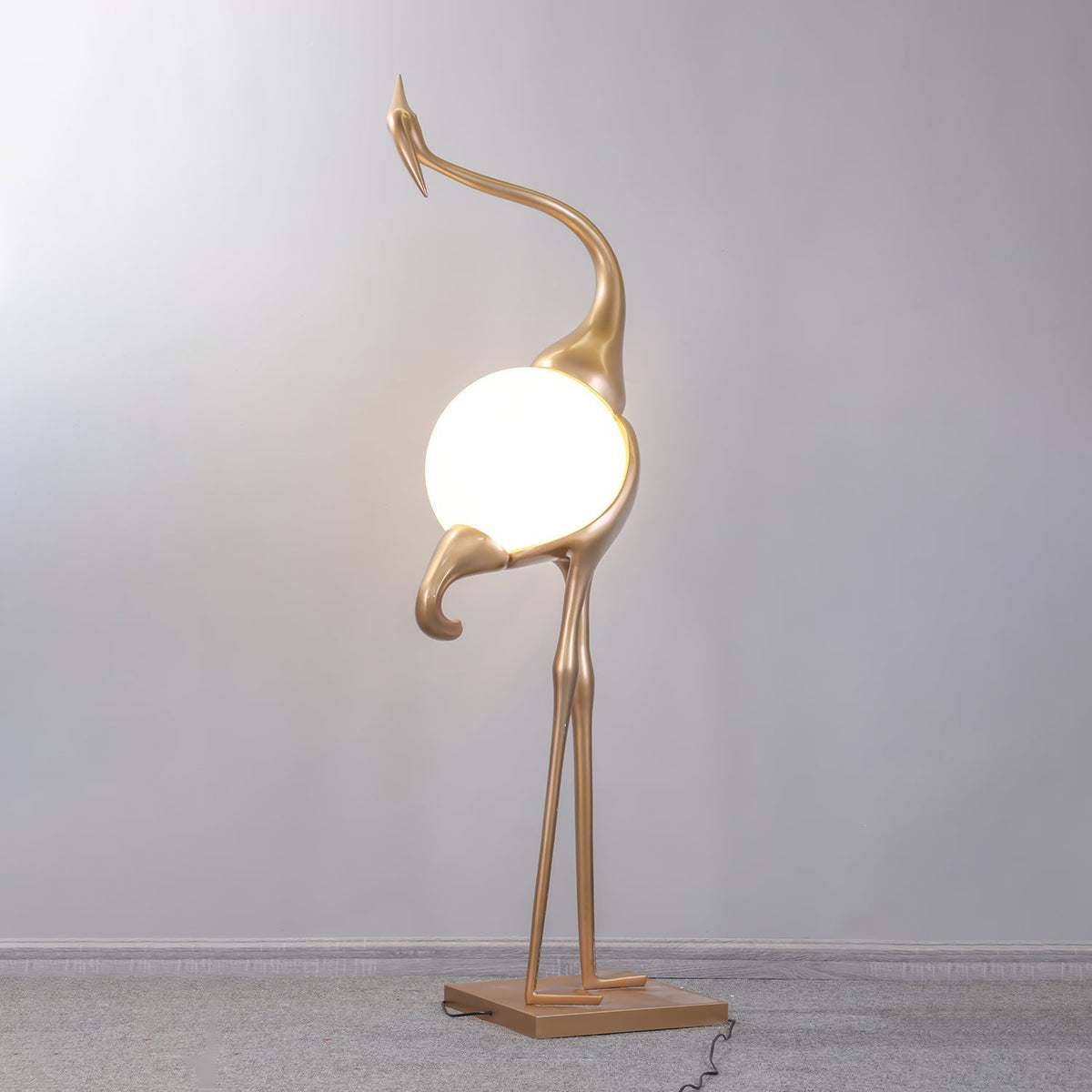 Uraearae wandlamp in vorm van een kraan