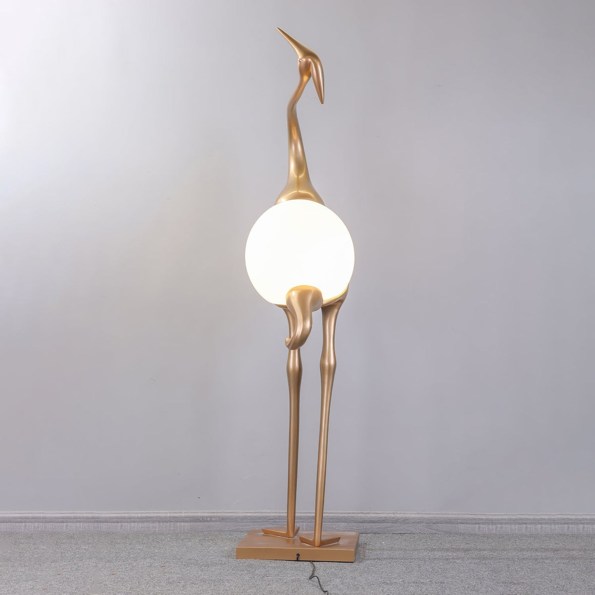 Uraearae wandlamp in vorm van een kraan
