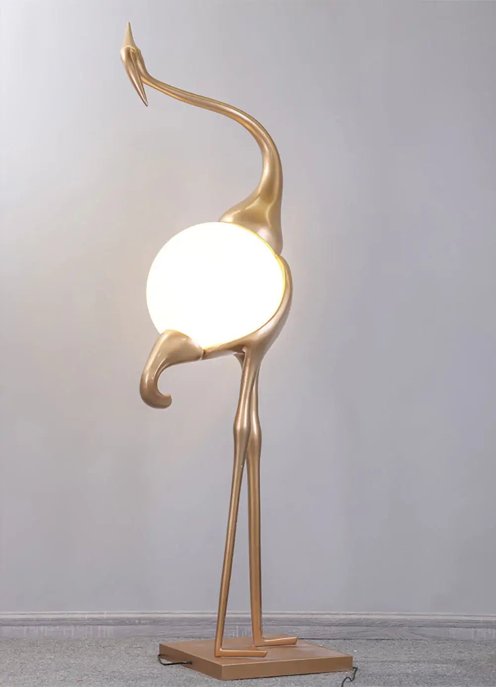 Uraearae wandlamp in vorm van een kraan