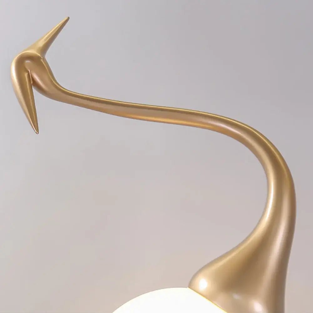 Uraearae wandlamp in vorm van een kraan
