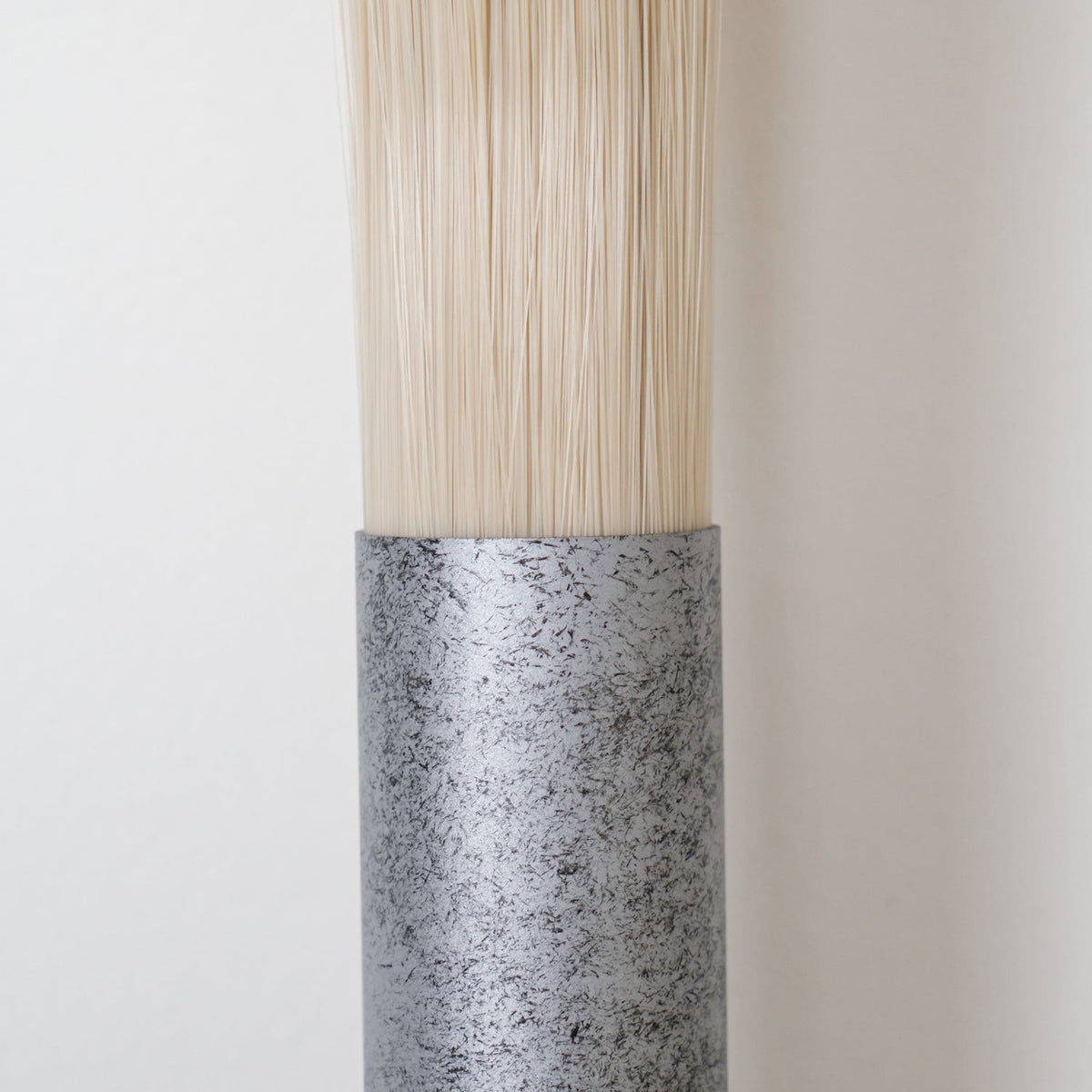 Aurelielle wandlamp met paardenhaar en messing afwerking