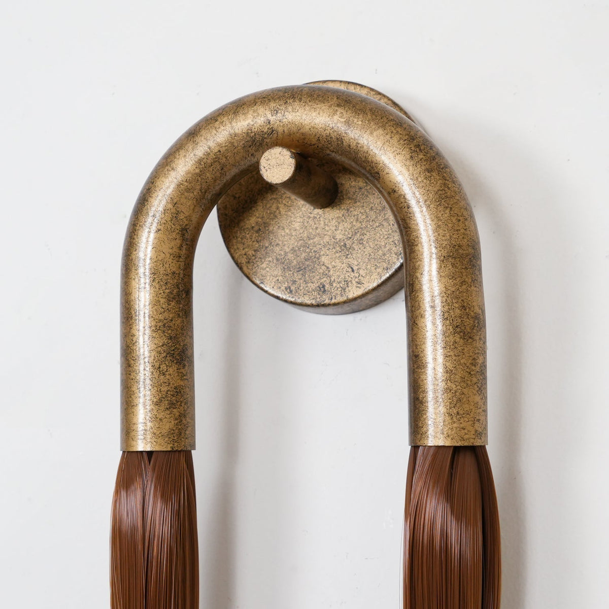 Aurelielle wandlamp met paardenhaar en messing afwerking