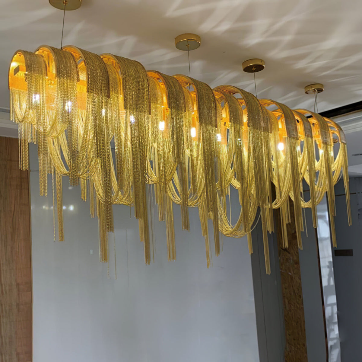 Tarien kroonluchter met gelaagde kettingen in nikklevering luxe