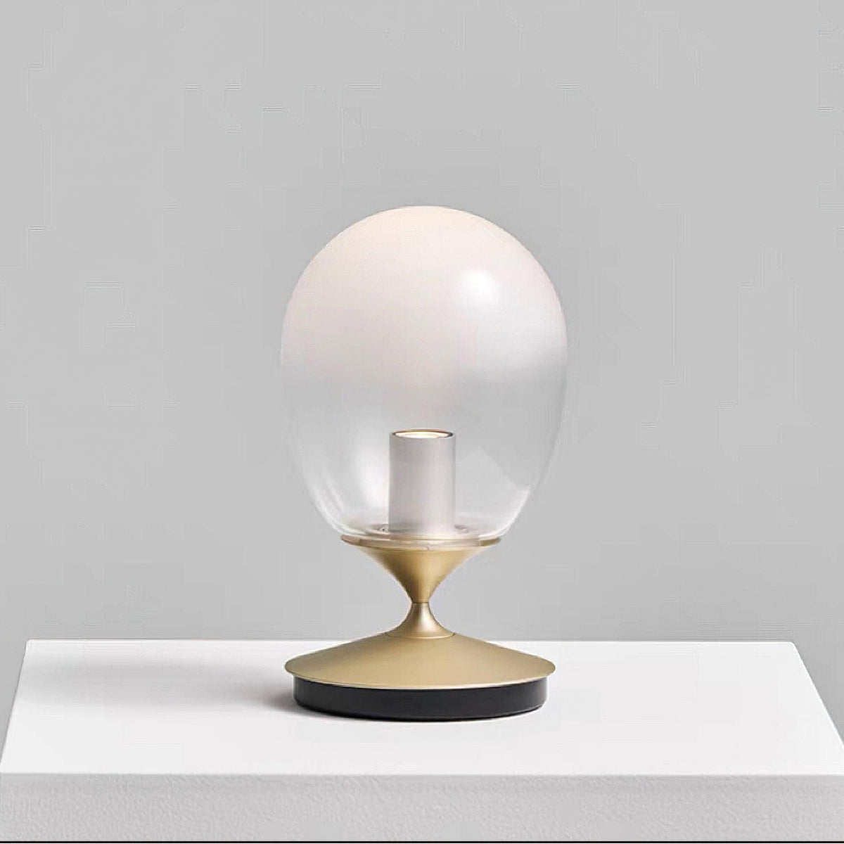 Unex tafellamp van goudkleurig glas