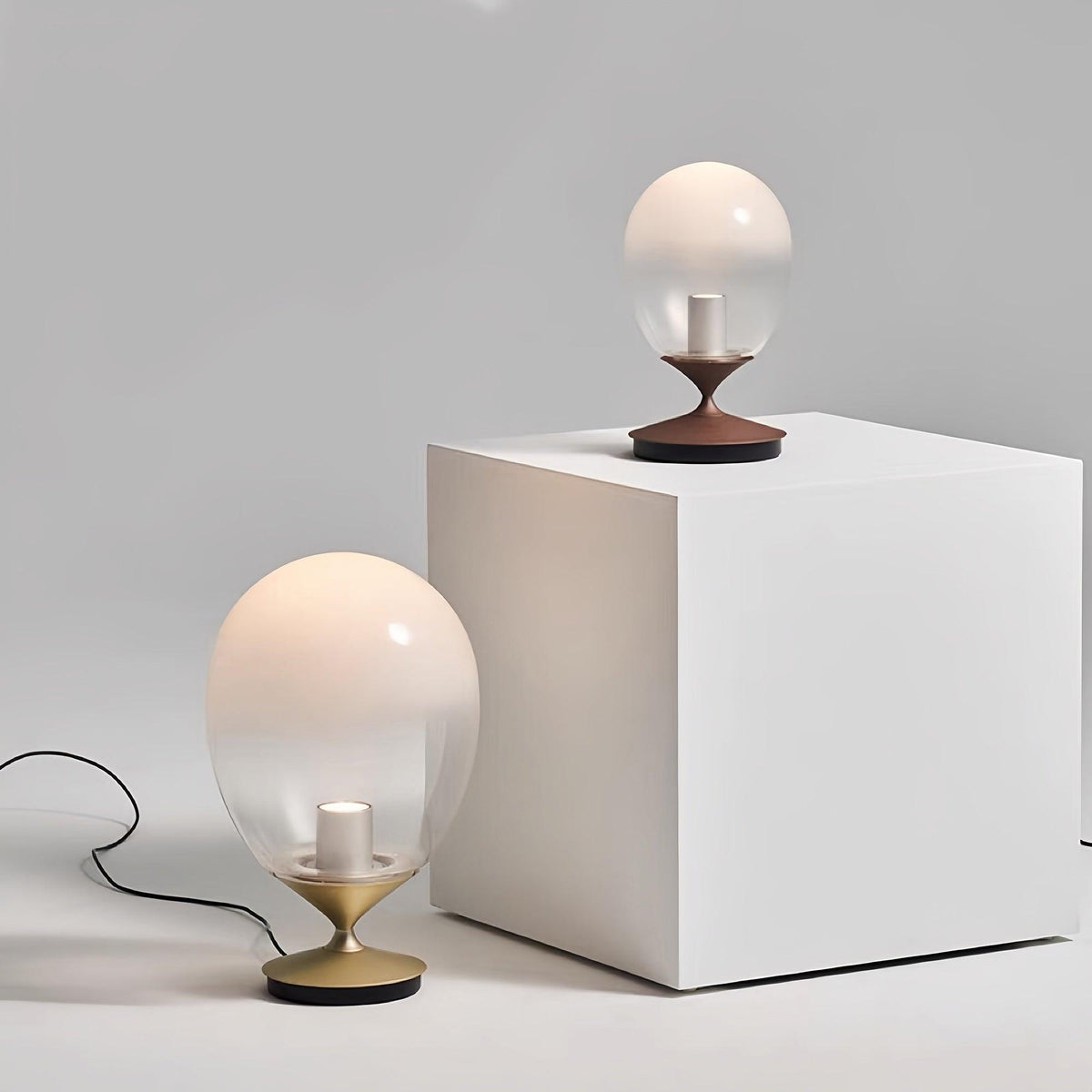Unex tafellamp van goudkleurig glas