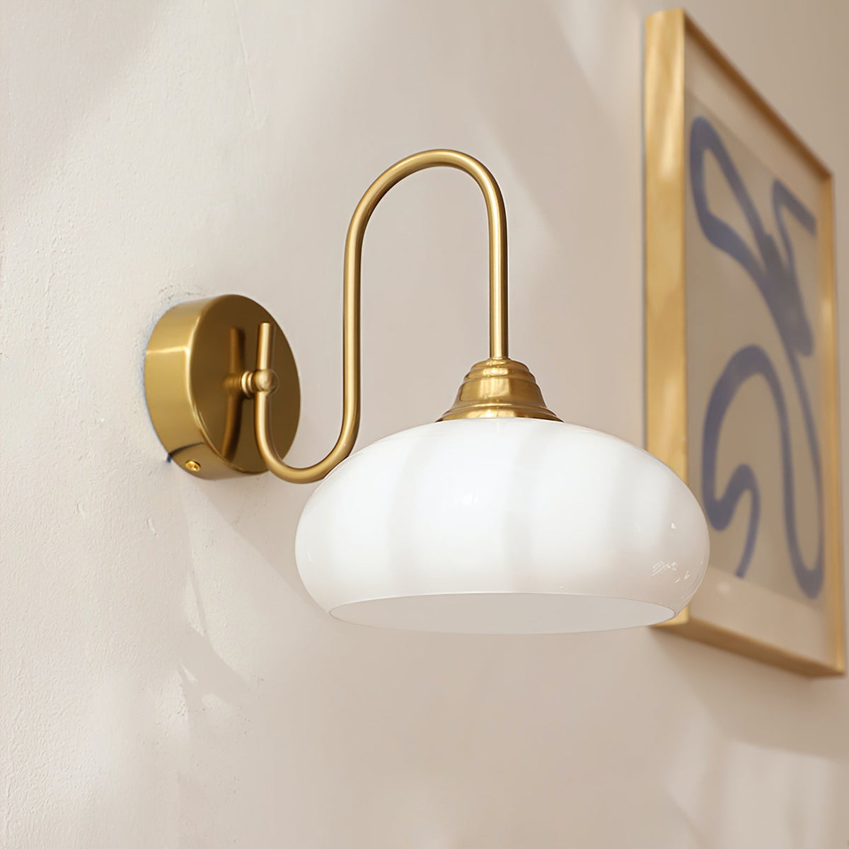 Ophaan wandlamp