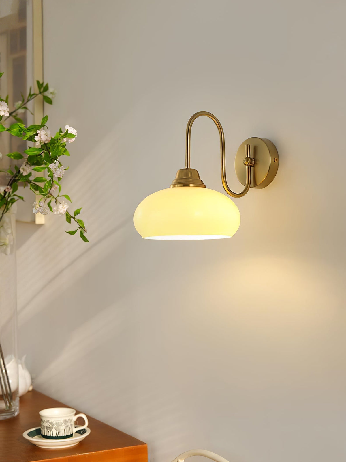 Ophaan wandlamp