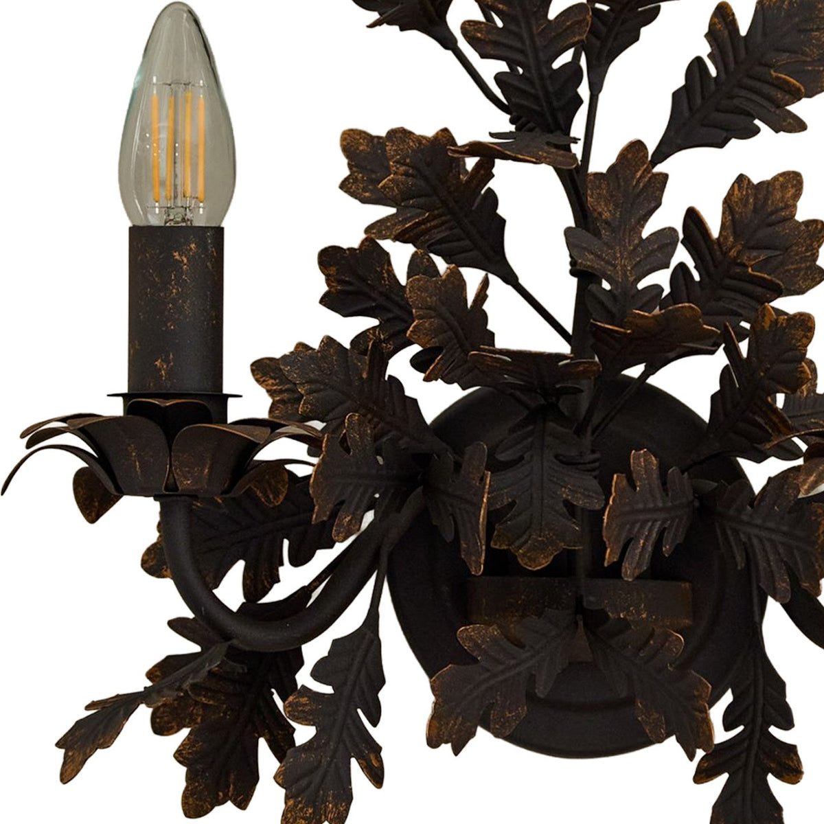 Orvaline wandlamp in gevlochten ijzer met eikenvormige bladeren
