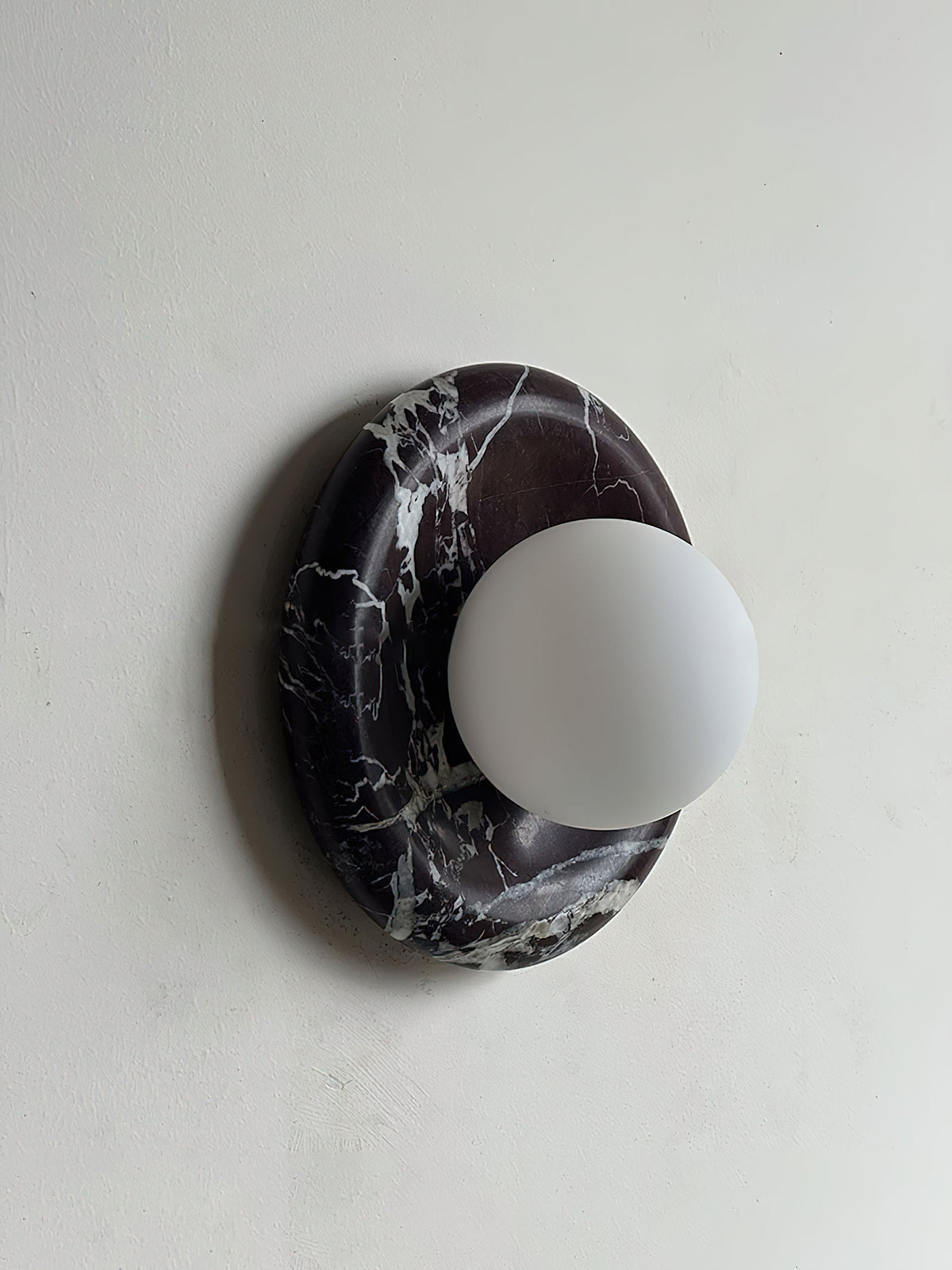 Uzorionis wandlamp