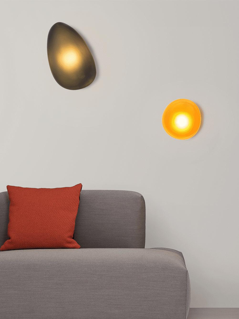 Eirinina wandlamp met bolvormig glas