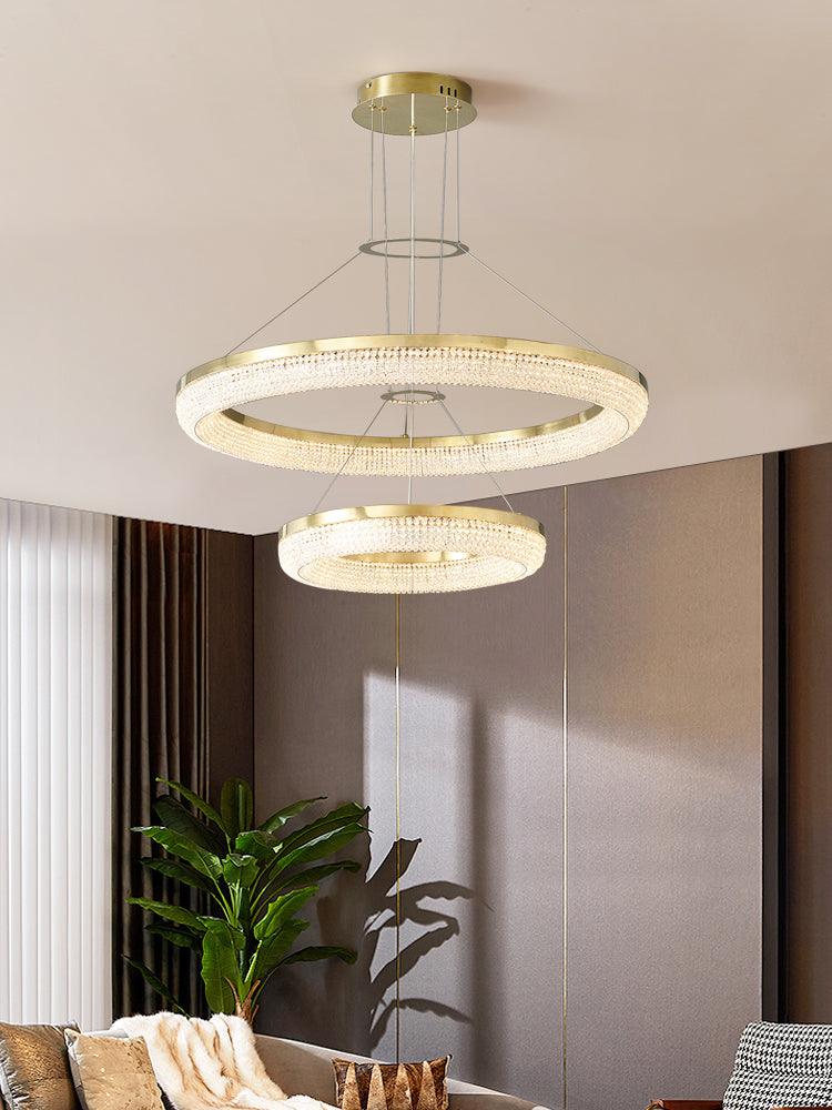 Cyrereon kroonluchter met ronde ringen van kristal in goudkleurige afwerking