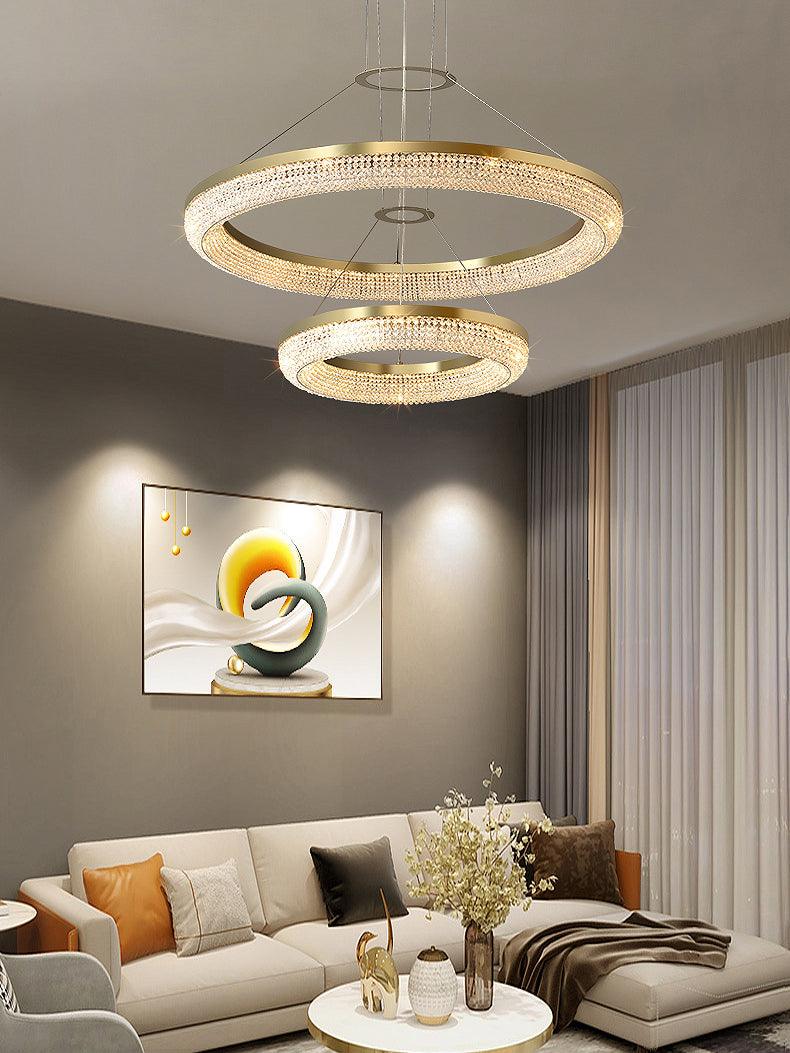 Cyrereon kroonluchter met ronde ringen van kristal in goudkleurige afwerking