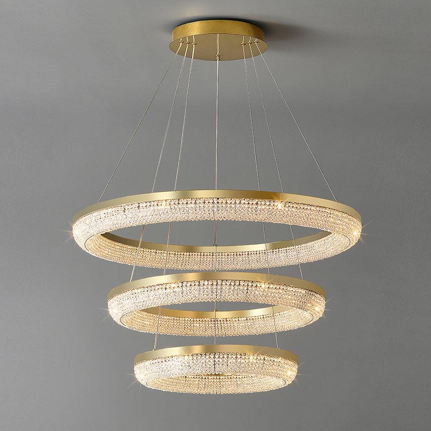Cyrereon kroonluchter met ronde ringen van kristal in goudkleurige afwerking
