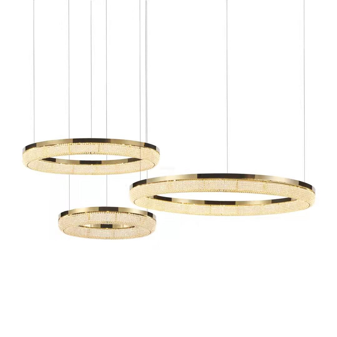 Cyrereon kroonluchter met ronde ringen van kristal in goudkleurige afwerking