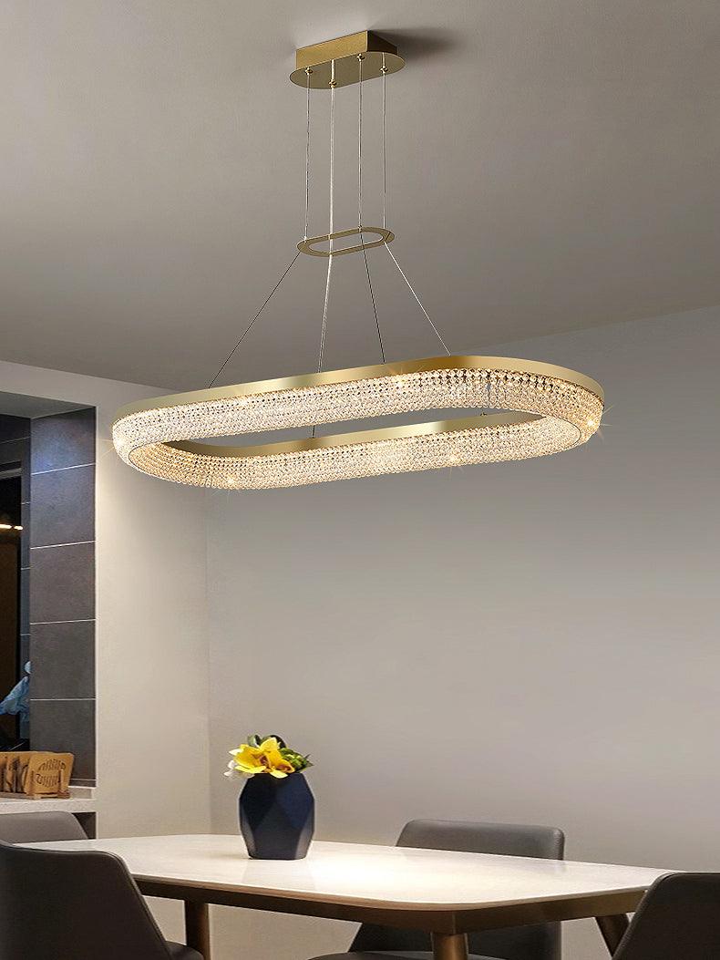 Cyrereon kroonluchter met ronde ringen van kristal in goudkleurige afwerking