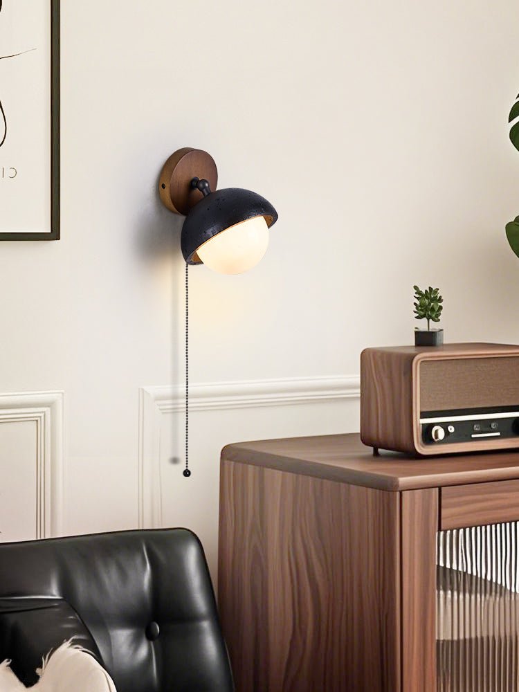 Serenaria bollen Zwart travertin Draaibaar wandlamp