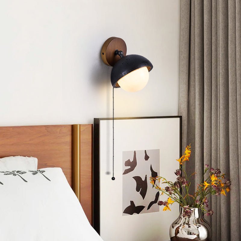 Serenaria bollen Zwart travertin Draaibaar wandlamp
