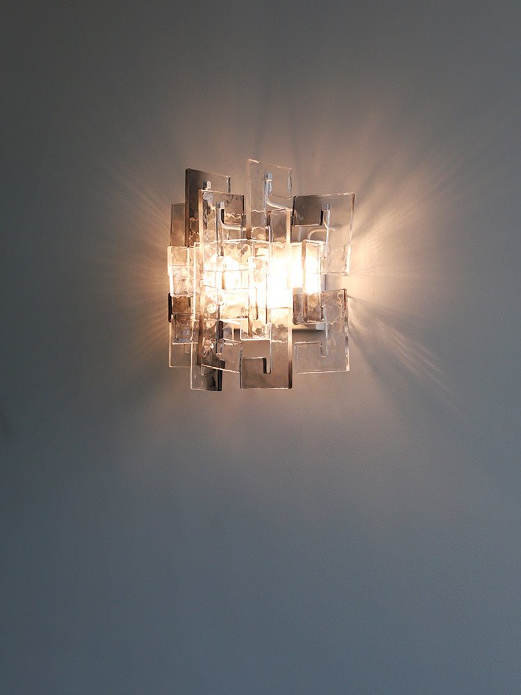 Stacked wandlamp met glazen kap
