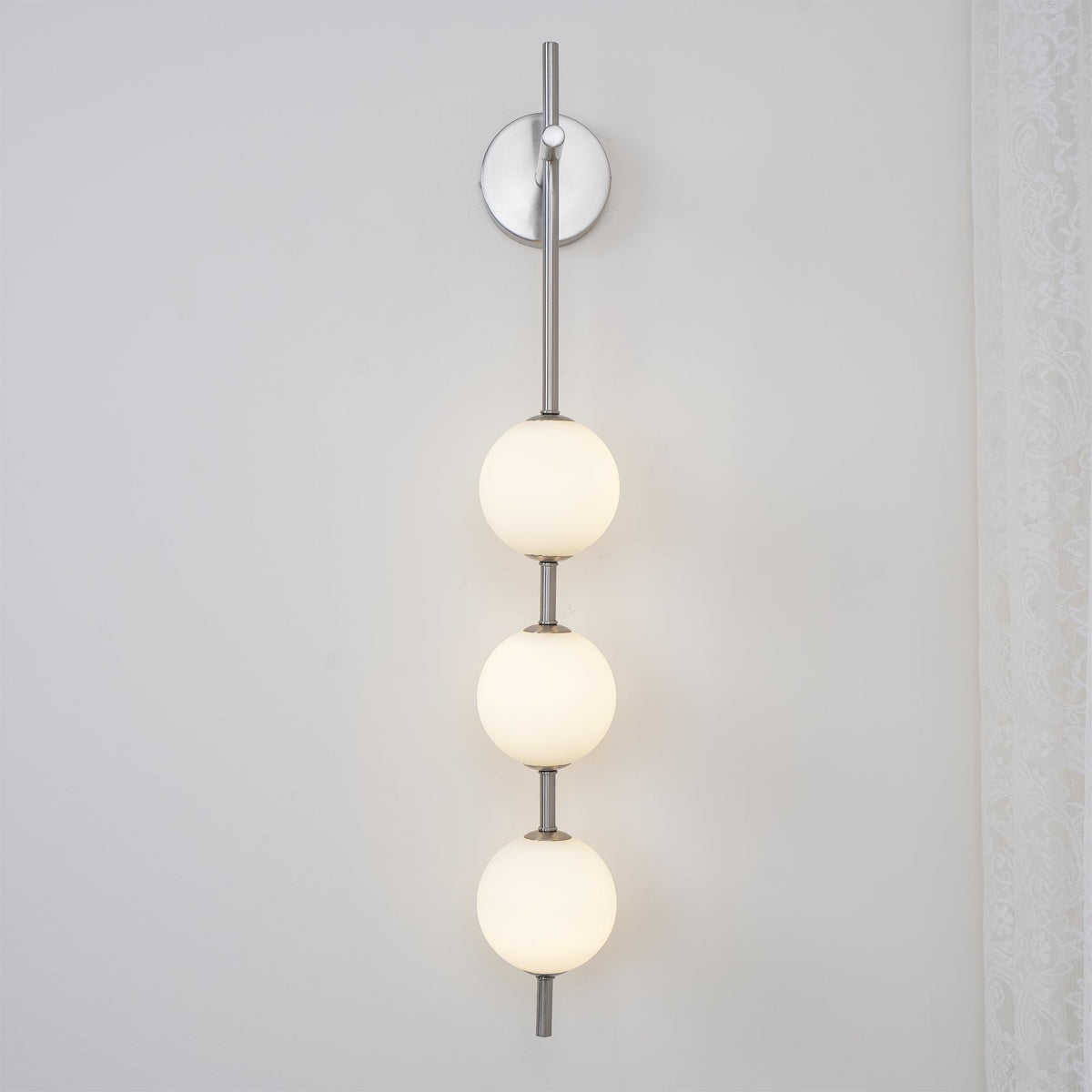 Ilraeia wandlamp met verticale bollen