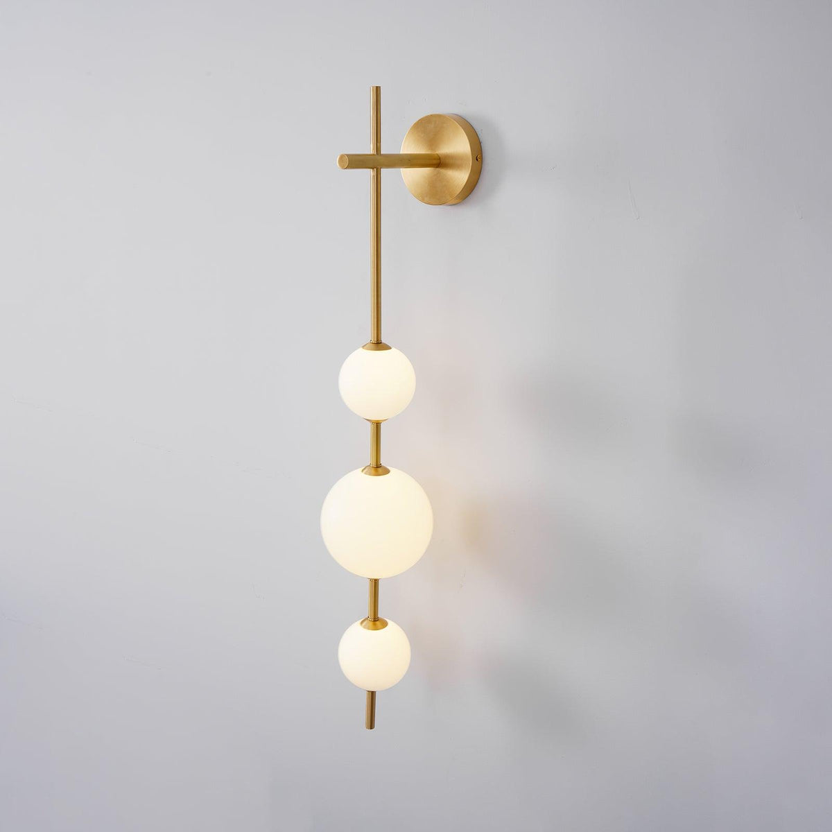 Ilraeia wandlamp met verticale bollen