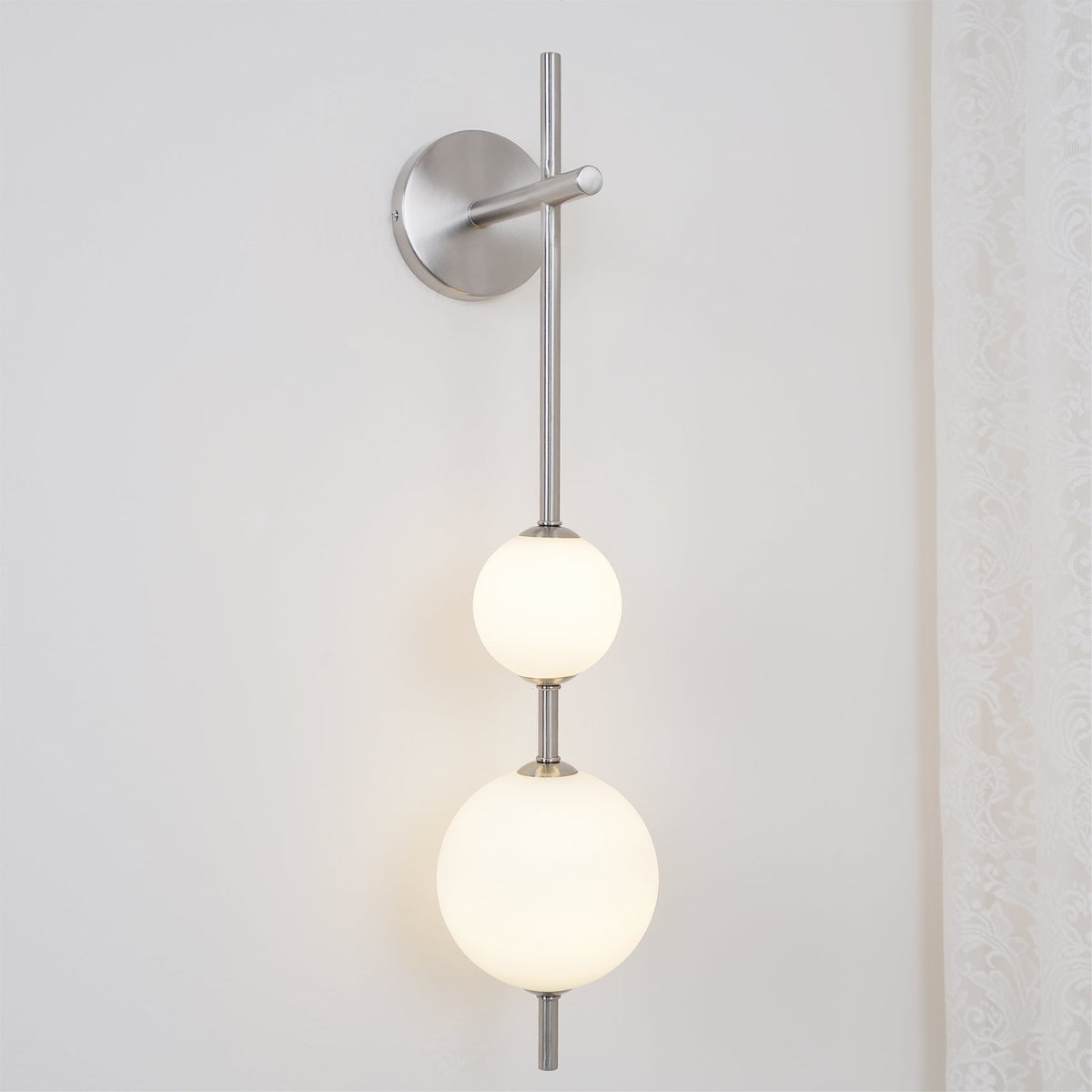 Ilraeia wandlamp met verticale bollen