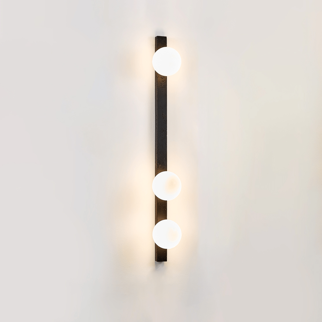 Zoshaira bollen Zwart travertin wandlamp