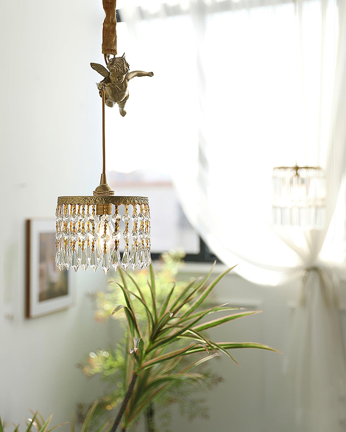 Calytra hanglamp in messing met kristal