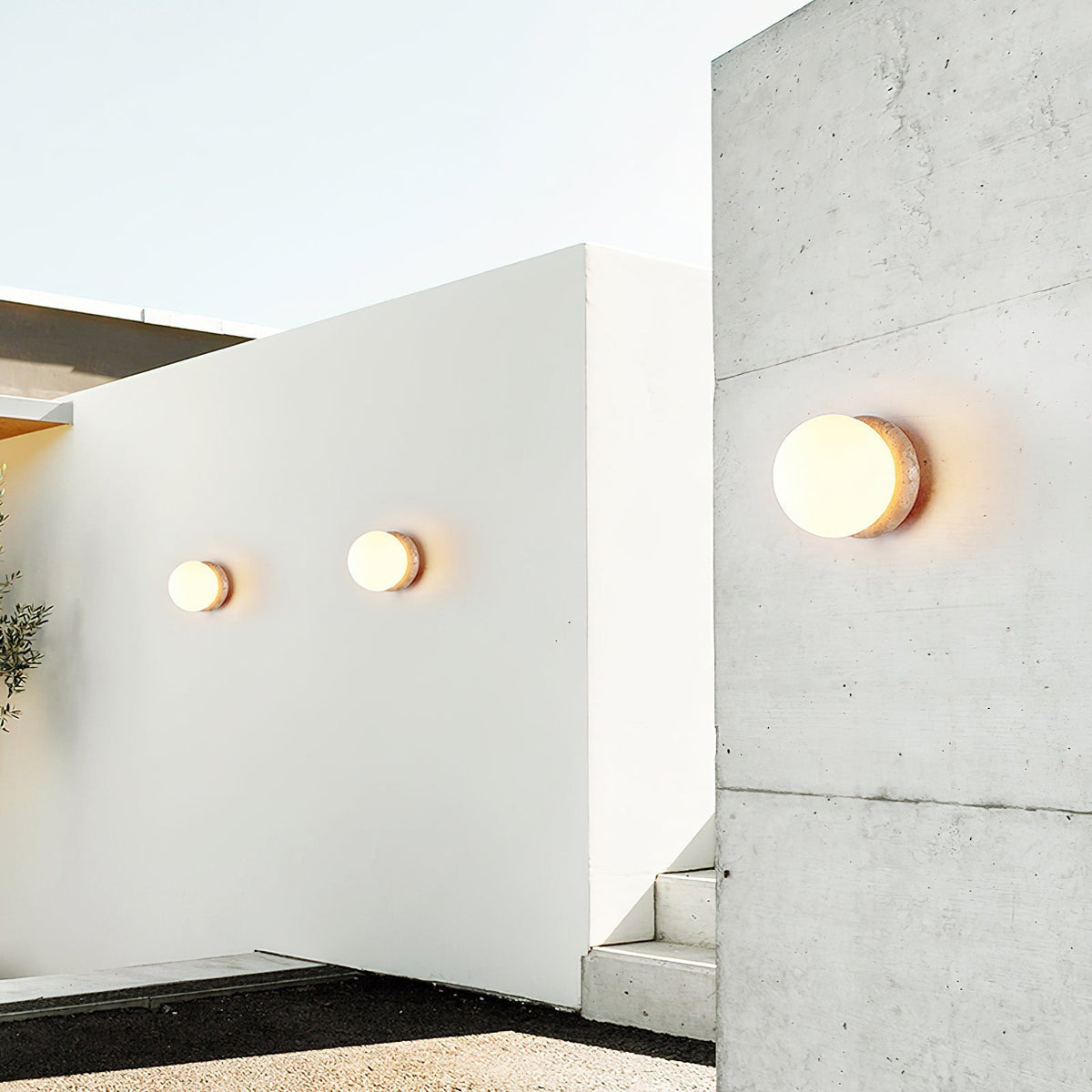 Taverelia ronde plaat wandlamp in geel travertin