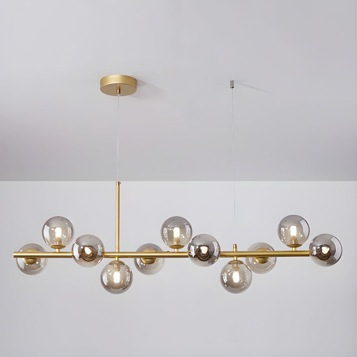 Lioroora kroonluchter met glazen bol goudkleurige afwerking 12-Light