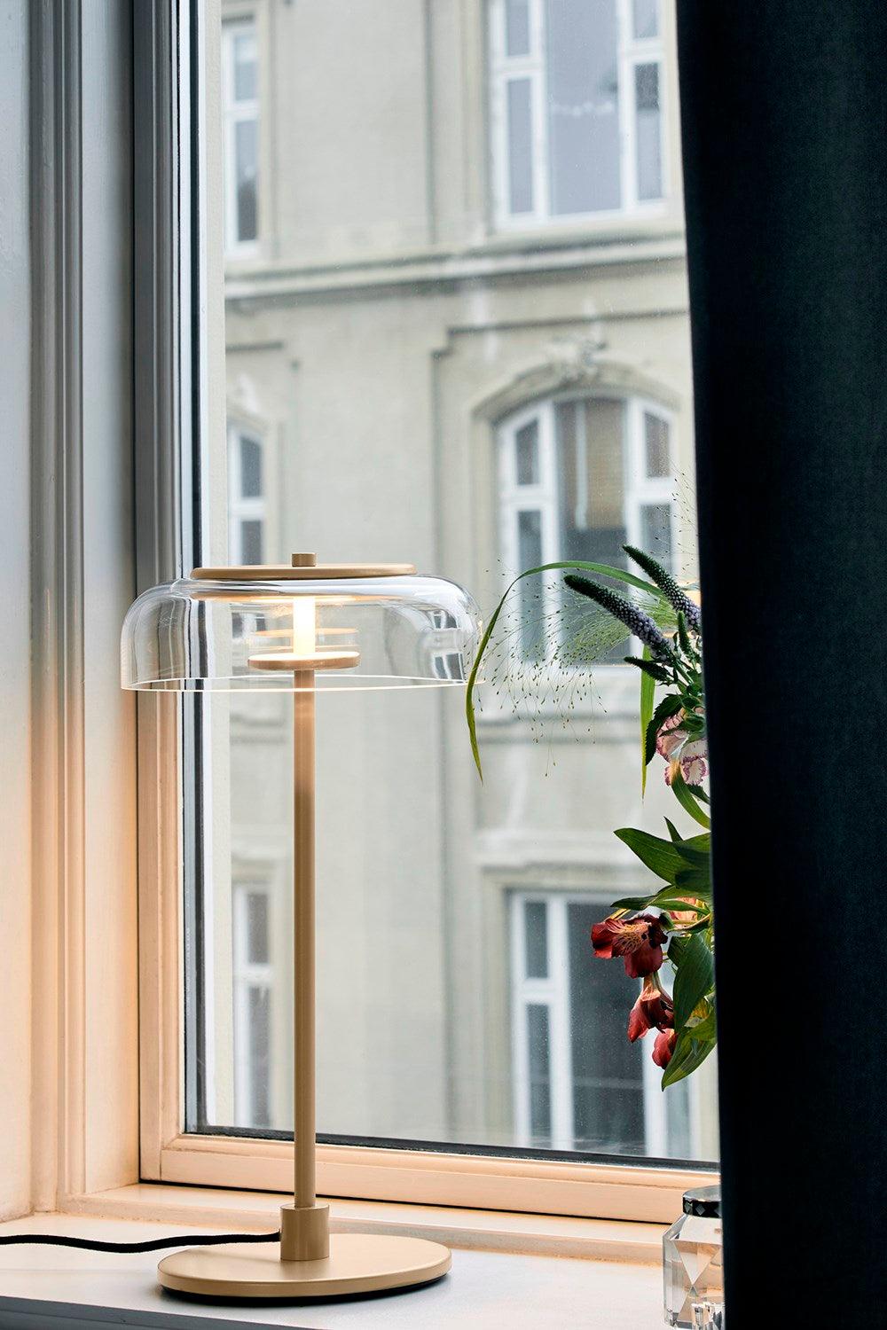 Rinelette tafellamp heldere glazen kap houten voet