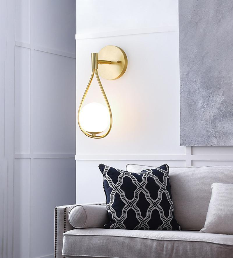 Eiralaya Moderne wandlamp van messing met glas in minimalistisch design