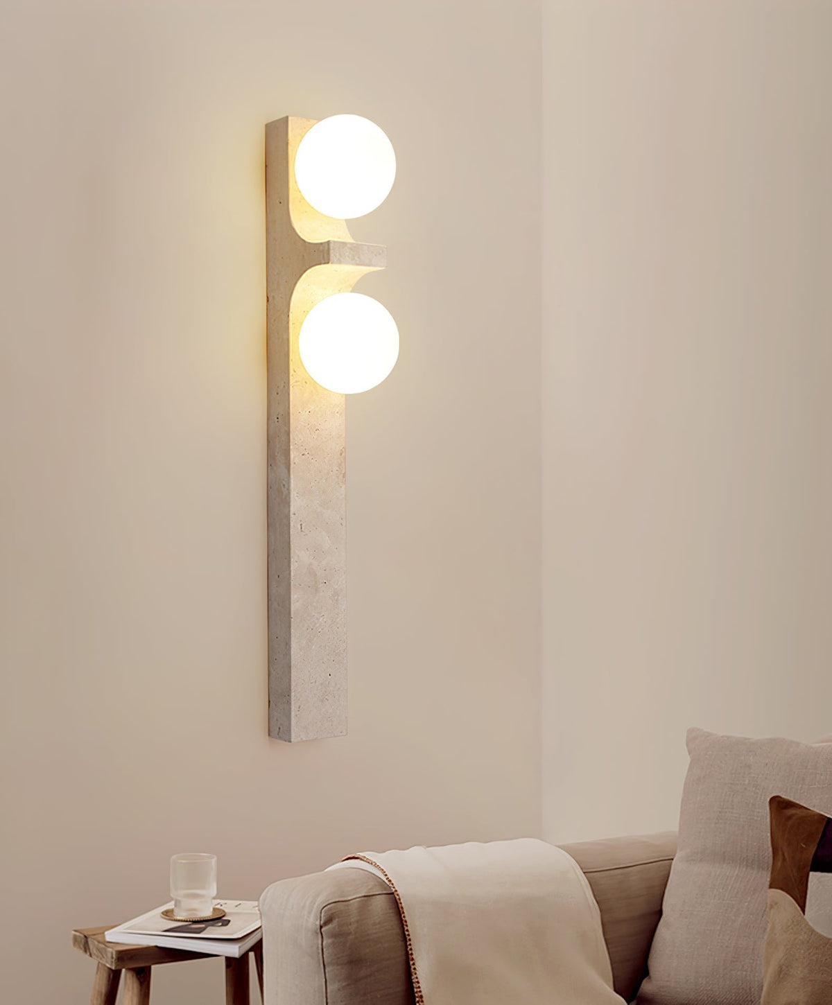 Umiren wandlamp van geel travertin