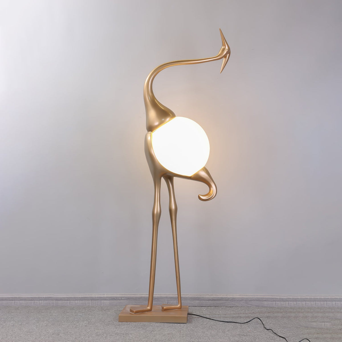 Uraearae wandlamp in vorm van een kraan