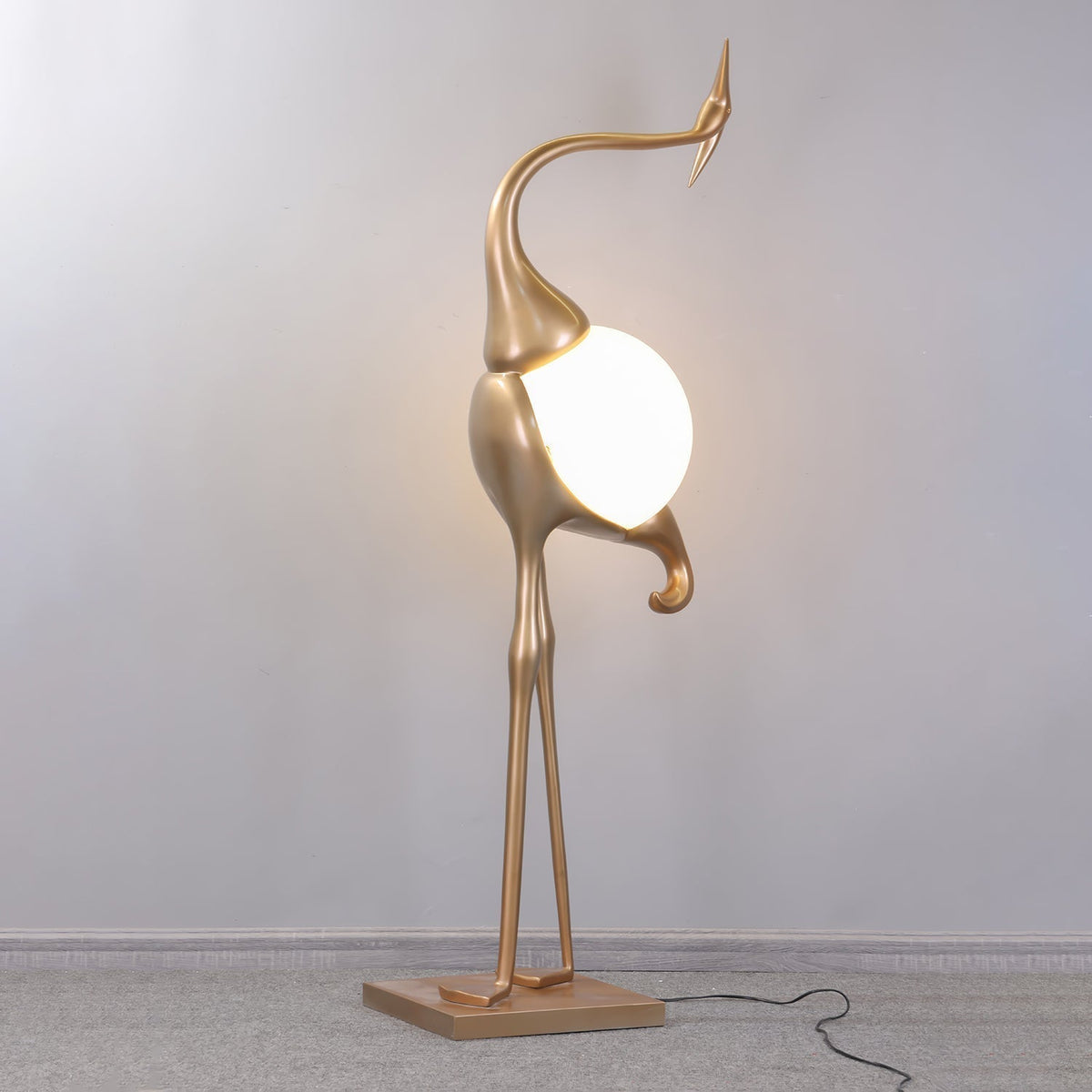 Uraearae wandlamp in vorm van een kraan