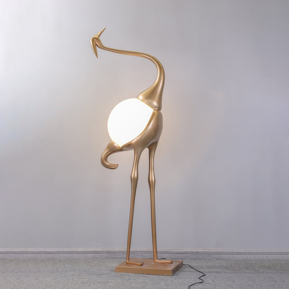 Uraearae wandlamp in vorm van een kraan