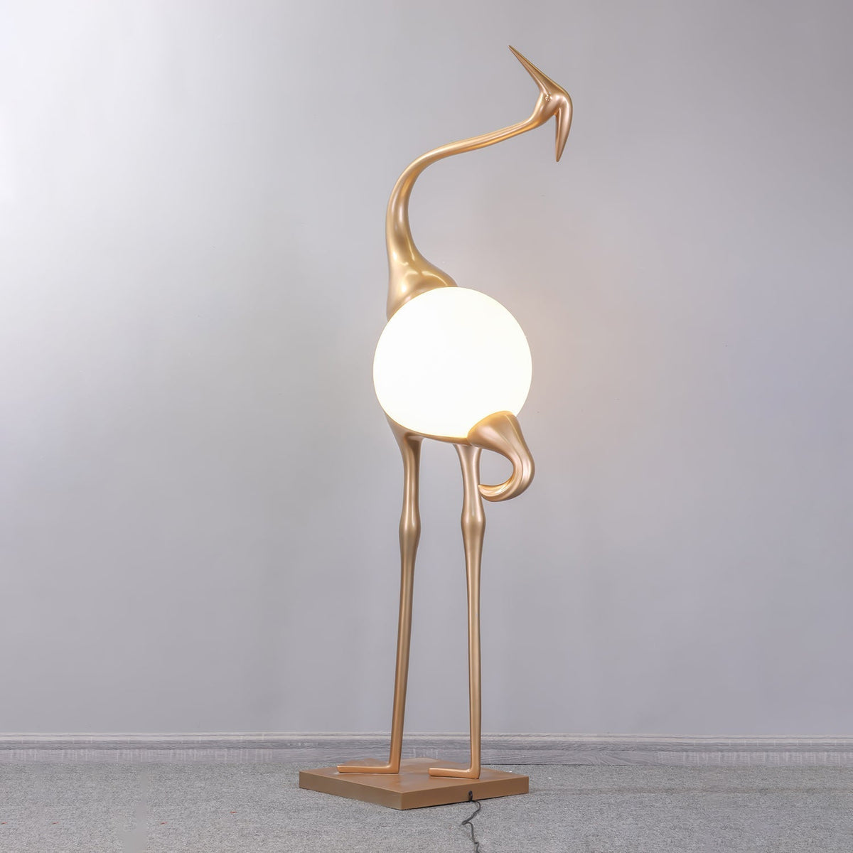 Uraearae wandlamp in vorm van een kraan