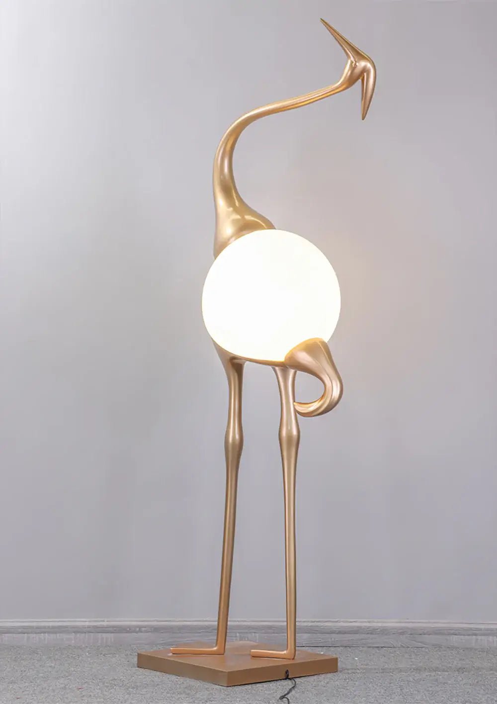 Uraearae wandlamp in vorm van een kraan