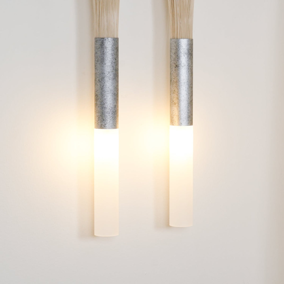 Aurelielle wandlamp met paardenhaar en messing afwerking