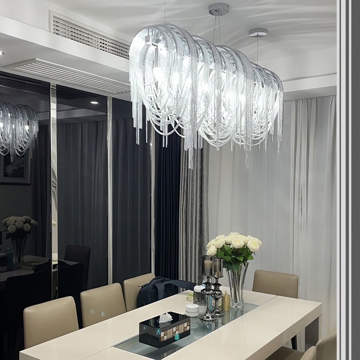 Tarien kroonluchter met gelaagde kettingen in nikklevering luxe