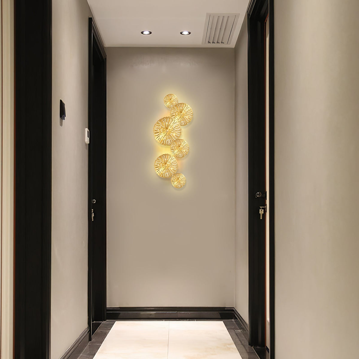 Rylso wandlamp Lotusbladeren messing
