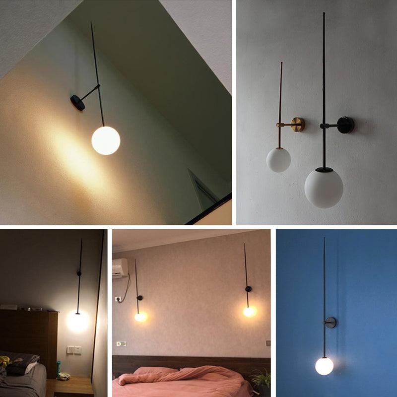 Veluelle Moderne minimalistische wandlamp met mobiele glaskogel