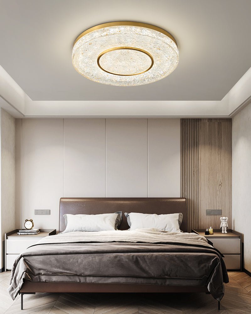 Auraora plafondlamp met mysterieuze cirkel van messing en hars