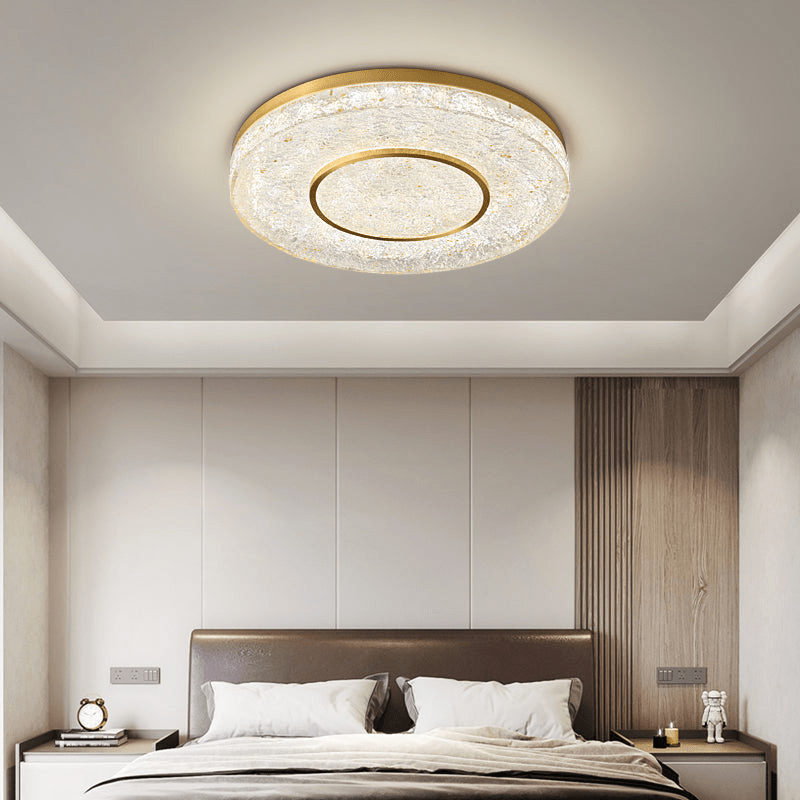 Auraora plafondlamp met mysterieuze cirkel van messing en hars
