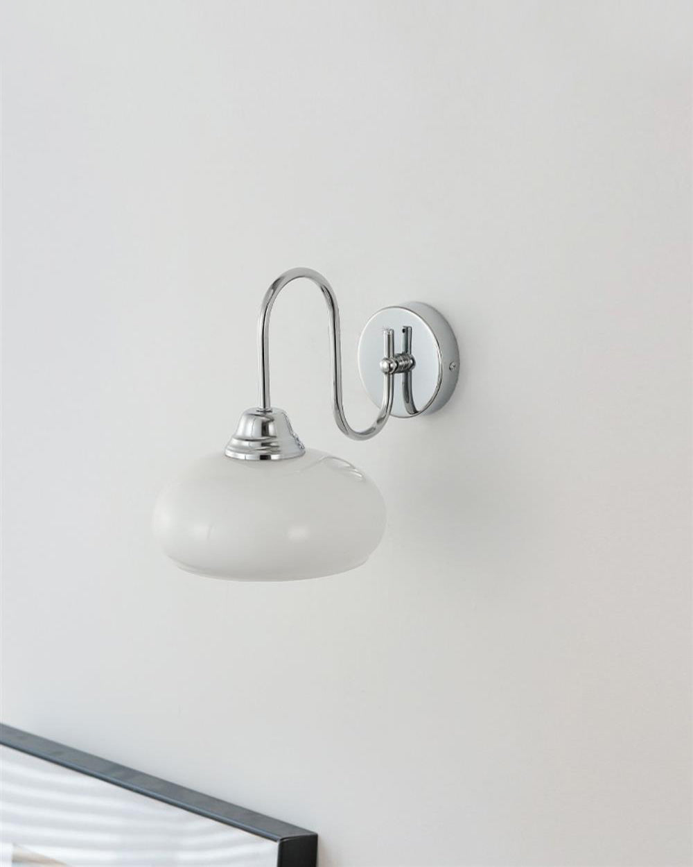 Ophaan wandlamp