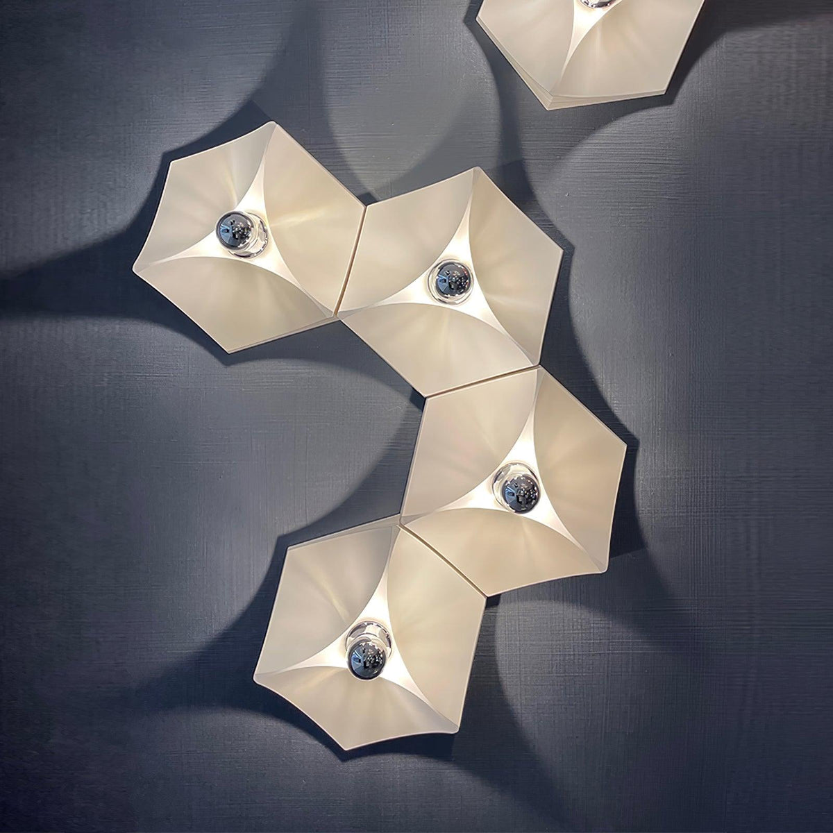 Linuira wandlamp stof geometrisch