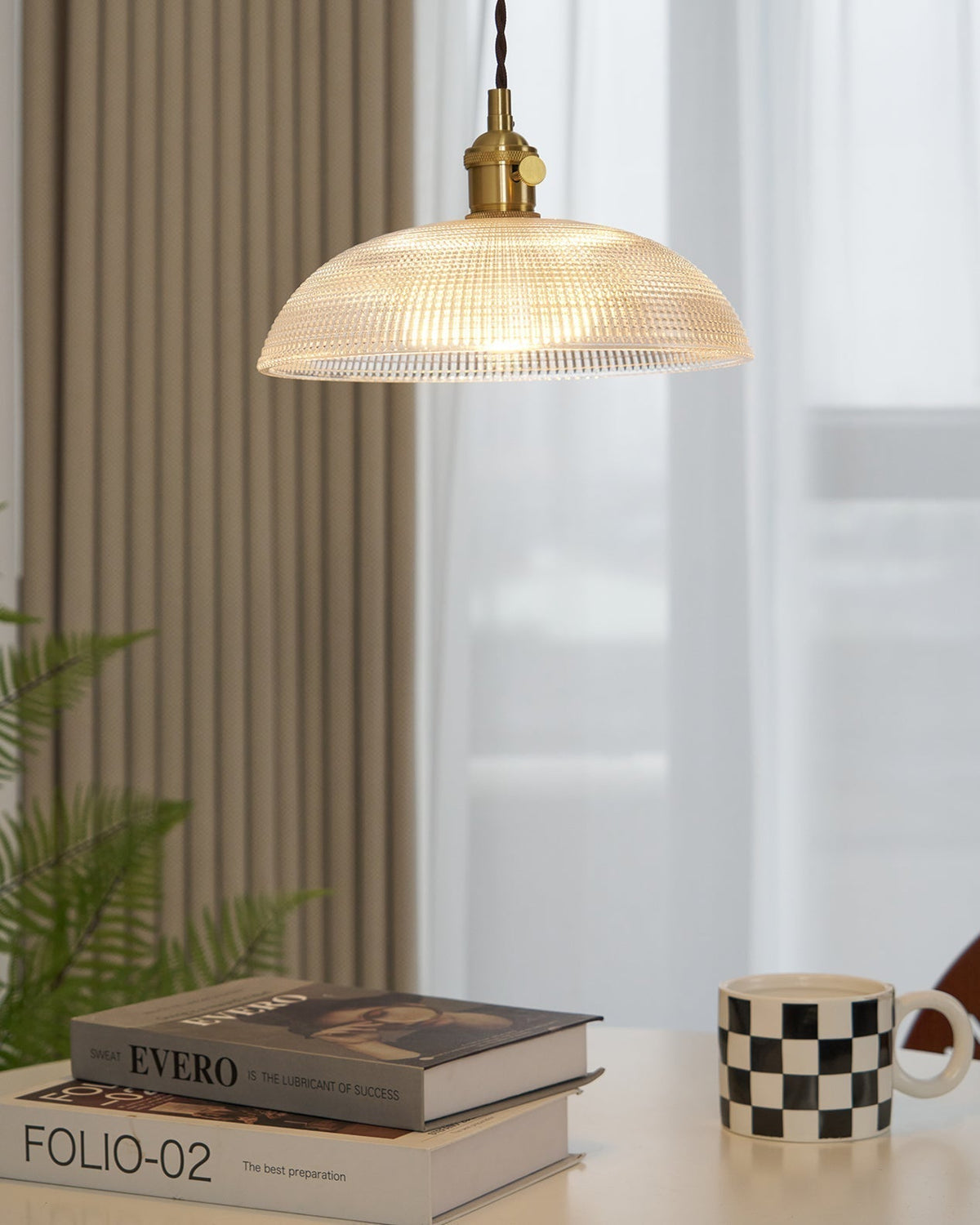 Crinel hanglamp van messing en glas
