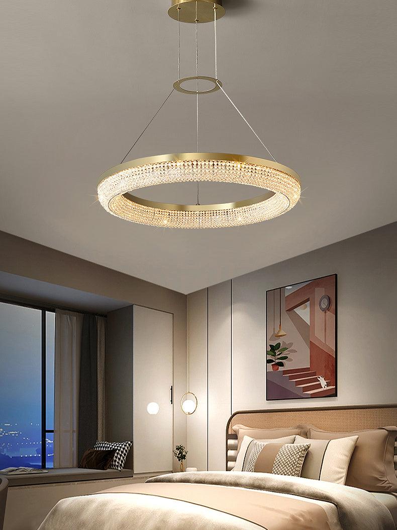 Cyrereon kroonluchter met ronde ringen van kristal in goudkleurige afwerking