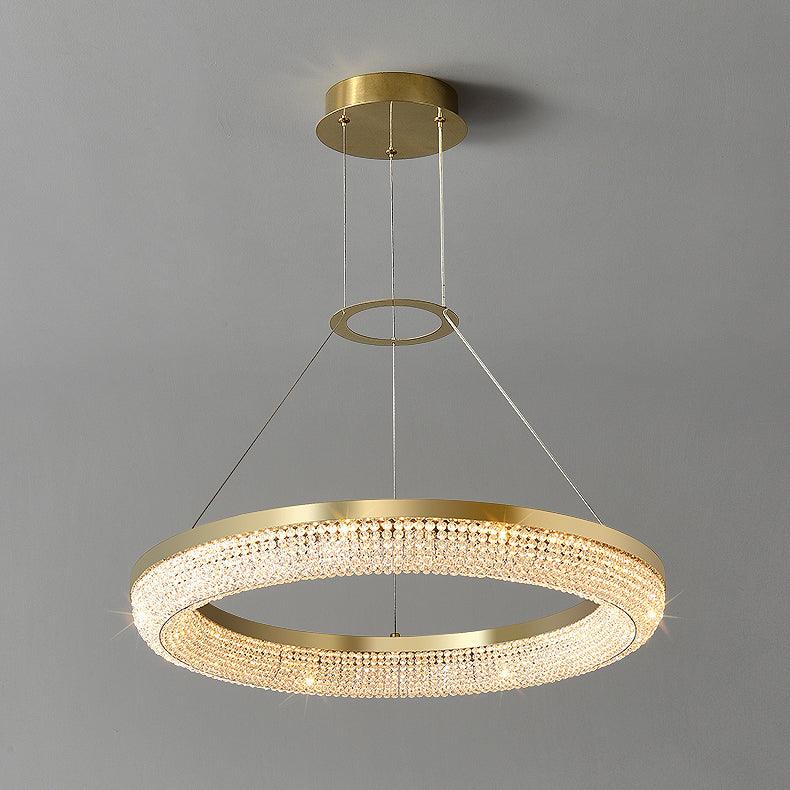 Cyrereon kroonluchter met ronde ringen van kristal in goudkleurige afwerking